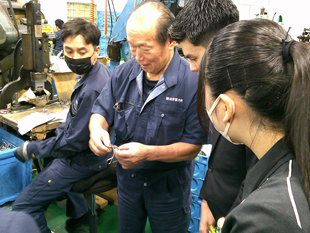 蛙印染色工芸 株式会社